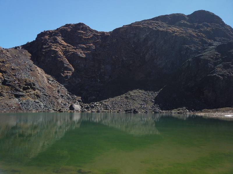 Utsho Tsho, a turquoise lake below rocky peaks on the Dagala trek