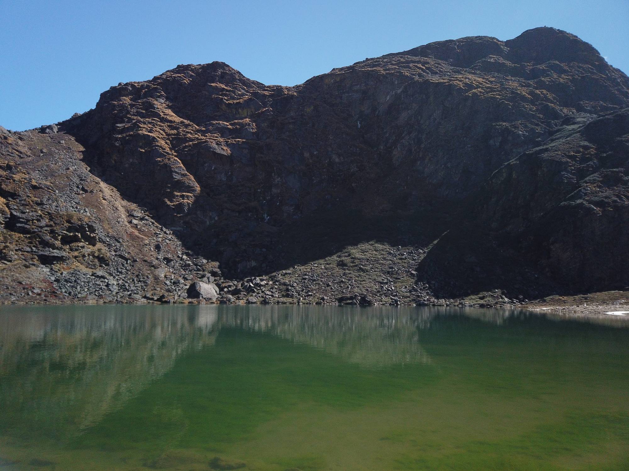 Utsho Tsho, a turquoise lake below rocky peaks on the Dagala trek