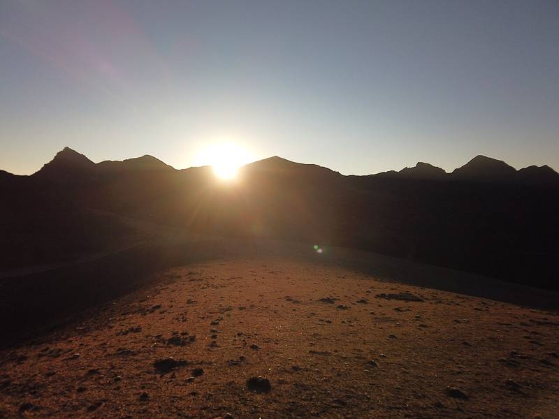 Sunrise from a small peak on Dagala, with the Himalaya on the skyline.